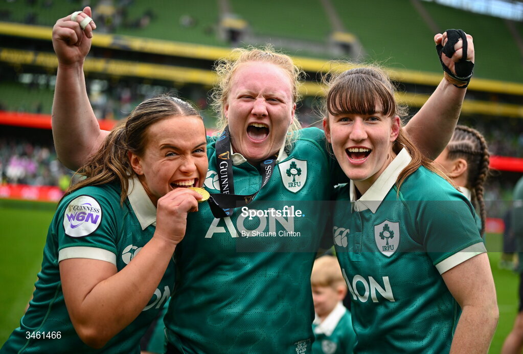 17 May 2026; Ireland players, from left, Robyn O'Connor, Aoife Wafer and Niamh Gallagher celebrate after their side's victory in the Women's 6 Nations Rugby Championship match between Ireland and Scotland at the Aviva Stadium in Dublin. Photo by Shauna Clinton/Sportsfile