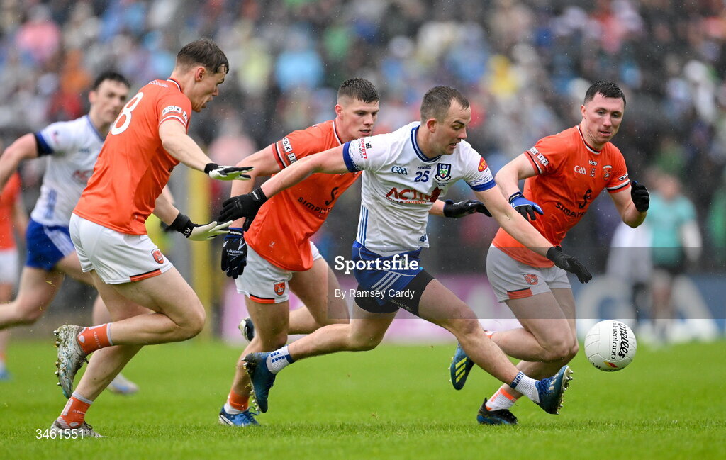 17 May 2026; Jack McCarron of Monaghan in action against Armagh players, from left, Oisin O'Neill, Gareth Murphy and Oisin Conaty during the Ulster GAA Football Senior Championship final match between Armagh and Monaghan at St Tiernach's Park in Clones, Monaghan. Photo by Ramsey Cardy/Sportsfile