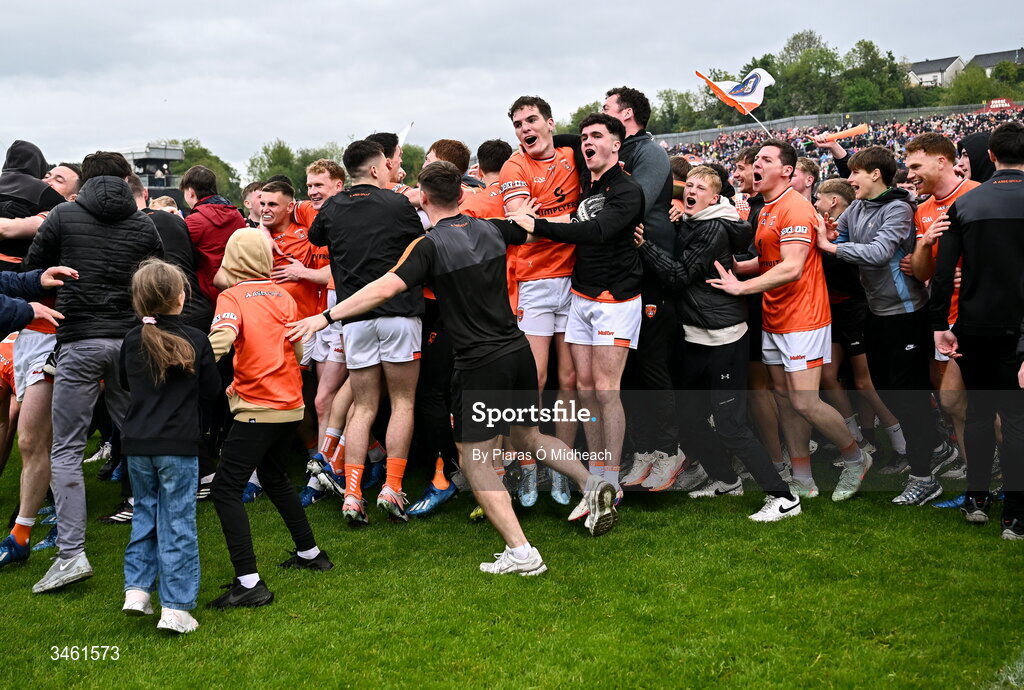 17 May 2026; Jarly Óg Burns of Armagh, centre, celebrates with team-mates and supporters after victory in the Ulster GAA Football Senior Championship final match between Armagh and Monaghan at St Tiernach's Park in Clones, Monaghan. Photo by Piaras Ó Mídheach/Sportsfile