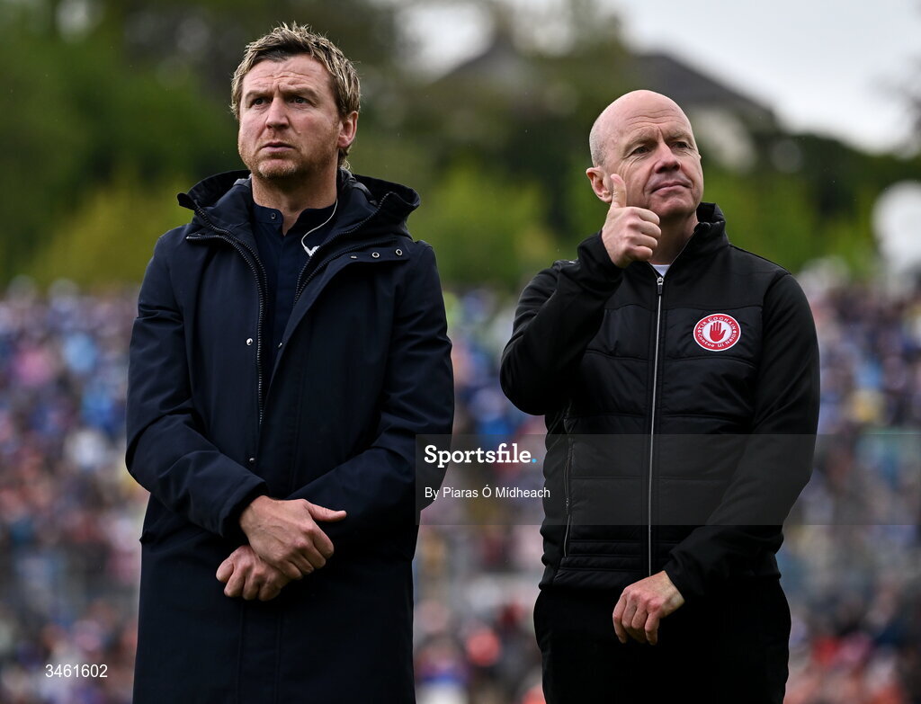 17 May 2026; Owen Mulligan, left, and Peter Canavan of the 2001 Tyrone team that won the Ulster SFC title and were honoured during jubilee celebrations at half-time in the Ulster GAA Football Senior Championship final match between Armagh and Monaghan at St Tiernach's Park in Clones, Monaghan. Photo by Piaras Ó Mídheach/Sportsfile
