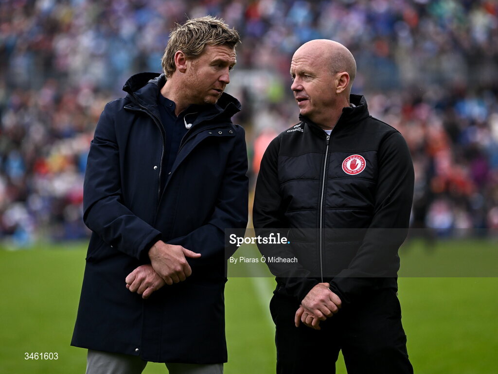 17 May 2026; Owen Mulligan, left, and Peter Canavan of the 2001 Tyrone team that won the Ulster SFC title and were honoured during jubilee celebrations at half-time in the Ulster GAA Football Senior Championship final match between Armagh and Monaghan at St Tiernach's Park in Clones, Monaghan. Photo by Piaras Ó Mídheach/Sportsfile