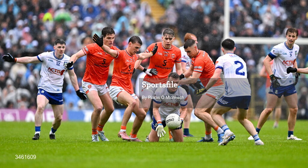 17 May 2026; Conor McCarthy of Monaghan passes under pressure from Armagh players during the Ulster GAA Football Senior Championship final match between Armagh and Monaghan at St Tiernach's Park in Clones, Monaghan. Photo by Piaras Ó Mídheach/Sportsfile