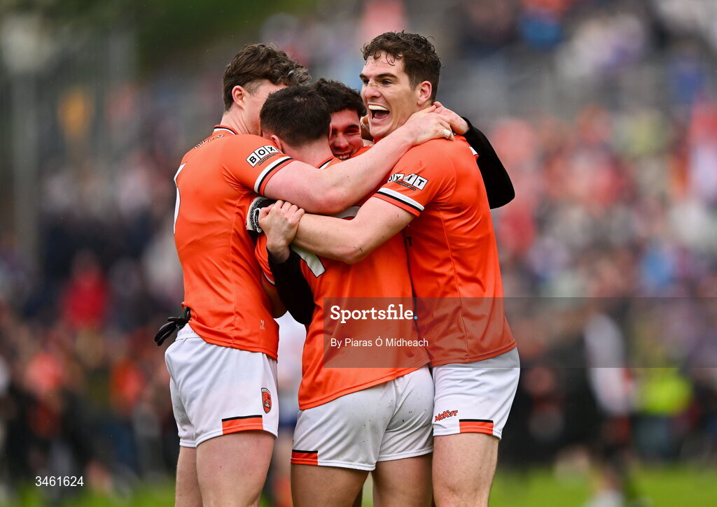 17 May 2026; Armagh players, including Jarly Óg Burns, right, celebrate after their side's victory in the Ulster GAA Football Senior Championship final match between Armagh and Monaghan at St Tiernach's Park in Clones, Monaghan. Photo by Piaras Ó Mídheach/Sportsfile