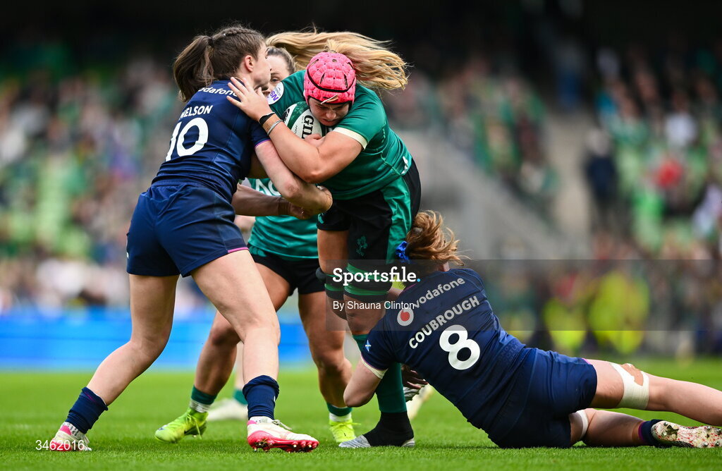 17 May 2026; Dorothy Wall of Ireland is tackled by Scotland players Helen Nelson, left, and Emily Coubrough during the Women's 6 Nations Rugby Championship match between Ireland and Scotland at the Aviva Stadium in Dublin. Photo by Shauna Clinton/Sportsfile