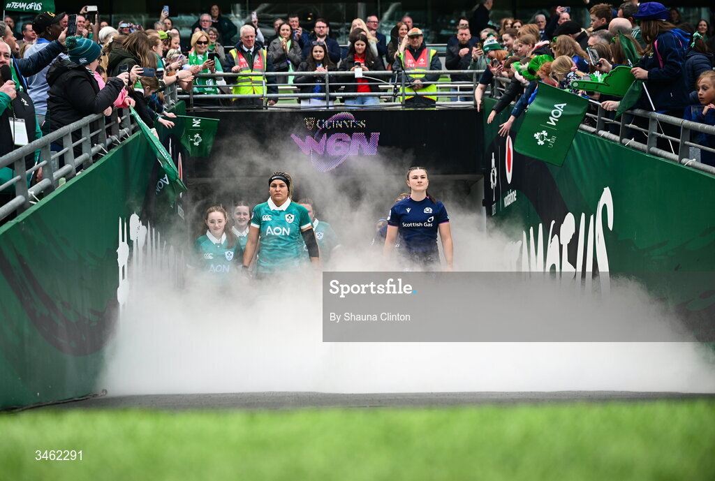 17 May 2026; Ireland captain Erin King, left, and Scotland captain Helen Nelson lead their teams onto the pitch ahead of the Women's 6 Nations Rugby Championship match between Ireland and Scotland at the Aviva Stadium in Dublin. Photo by Shauna Clinton/Sportsfile