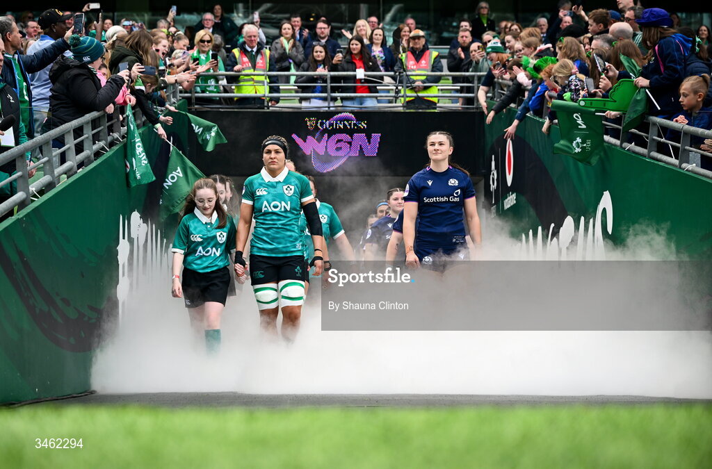 17 May 2026; Ireland captain Erin King, left, and Scotland captain Helen Nelson lead their teams onto the pitch ahead of the Women's 6 Nations Rugby Championship match between Ireland and Scotland at the Aviva Stadium in Dublin. Photo by Shauna Clinton/Sportsfile