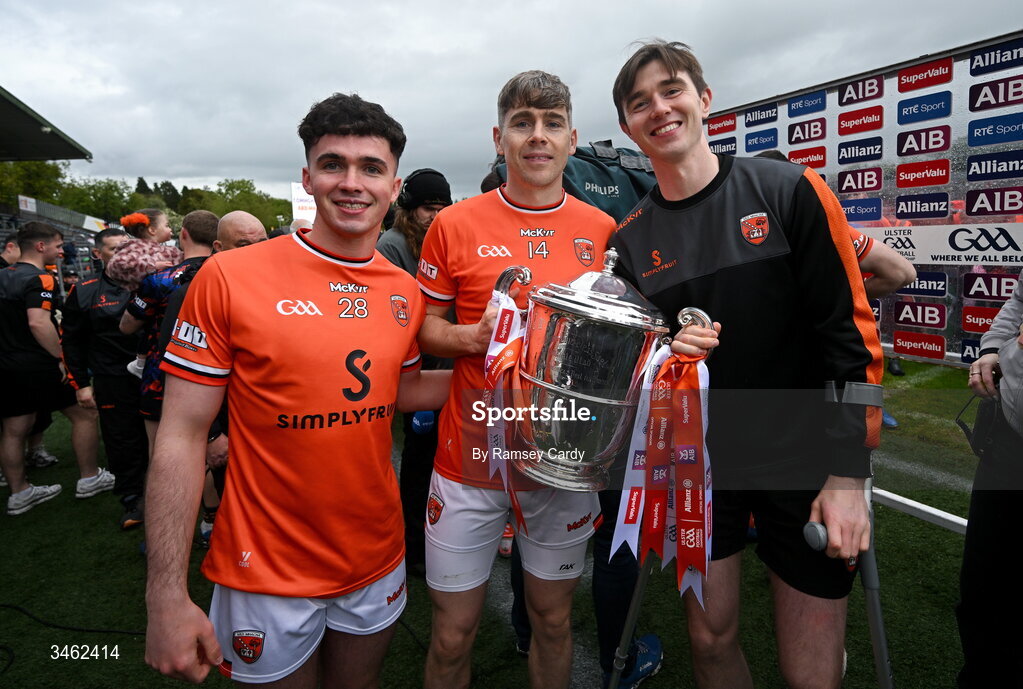 17 May 2026; Armagh players, from left, Callum O'Neill, Andrew Murnin and Ben Crealey with the Anglo Celt Cup after the Ulster GAA Football Senior Championship final match between Armagh and Monaghan at St Tiernach's Park in Clones, Monaghan. Photo by Ramsey Cardy/Sportsfile