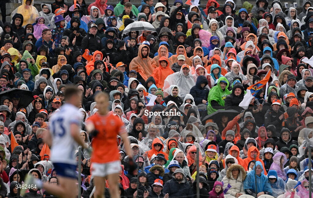 17 May 2026; Supporters watch on in the rain during the Ulster GAA Football Senior Championship final match between Armagh and Monaghan at St Tiernach's Park in Clones, Monaghan. Photo by Ramsey Cardy/Sportsfile