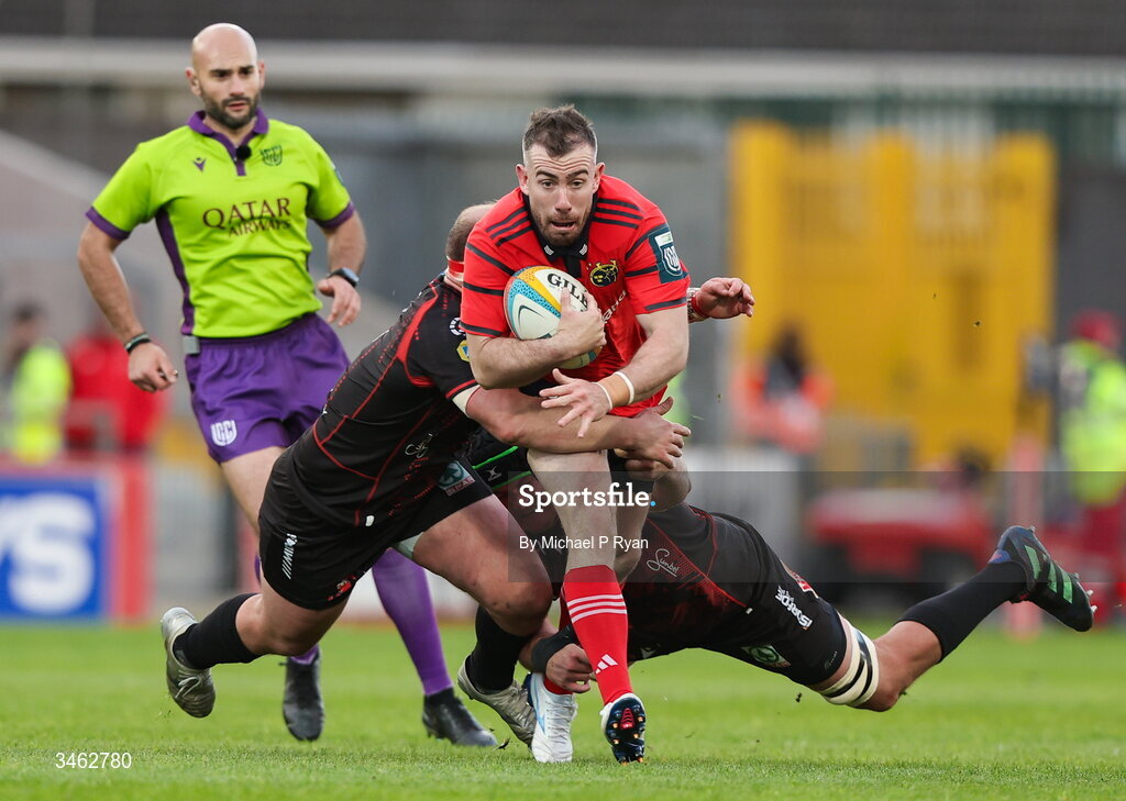 16 May 2026; JJ Hanrahan of Munster is tackled by Reinhard Nothnagel and PJ Botha of Lions during the United Rugby Championship match between Munster and Lions at Thomond Park in Limerick. Photo by Michael P Ryan/Sportsfile