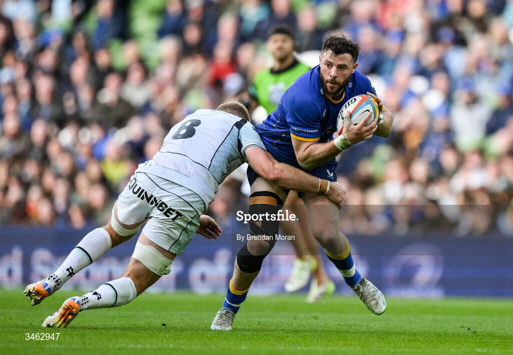 16 May 2026; Robbie Henshaw of Leinster is tackled by Ross Moriarty of Ospreys during the United Rugby Championship match between Leinster and Ospreys at the Aviva Stadium in Dublin. Photo by Brendan Moran/Sportsfile