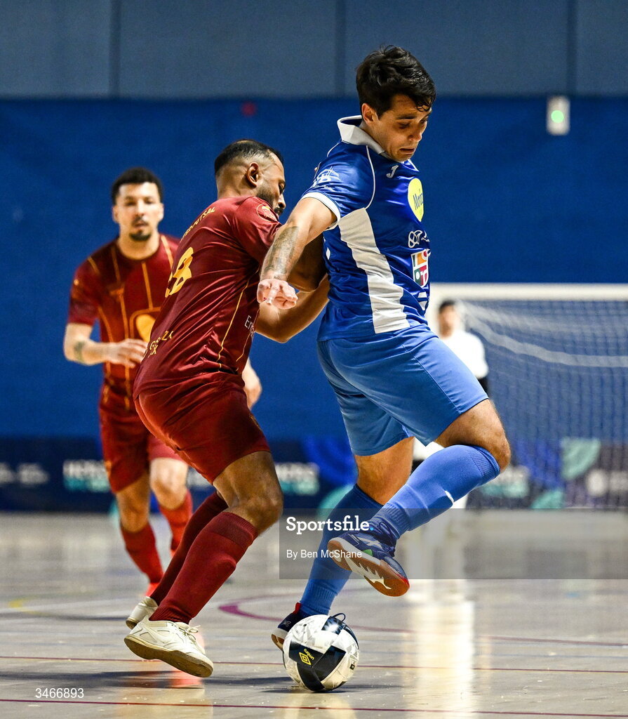 24 May 2026; Leonardes Mattheus of Blue Magic in action against Raphael Vieira de Souza of Leinster Futsal during the FAI Futsal Cup final match between Leinster Futsal and Blue Magic at the National Indoor Arena in Abbotstown, Dublin. Photo by Ben McShane/Sportsfile