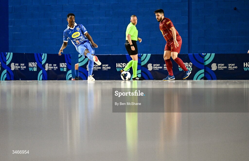 24 May 2026; Renan Henrique Cardeal of Blue Magic in action against Fernando Thales Rolin of Leinster Futsal during the FAI Futsal Cup final match between Leinster Futsal and Blue Magic at the National Indoor Arena in Abbotstown, Dublin. Photo by Ben McShane/Sportsfile