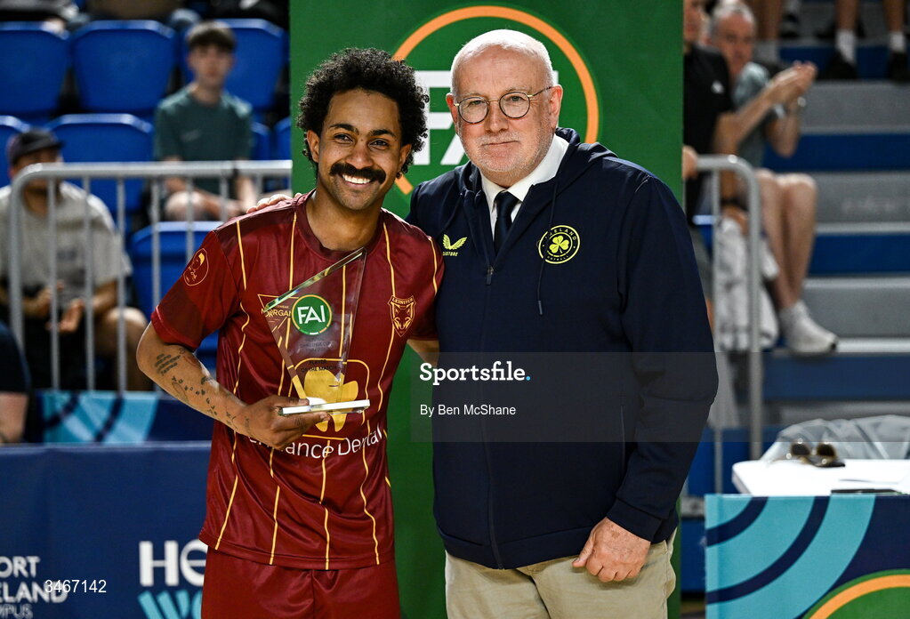 24 May 2026; FAI head of competitions Fran Gavin presents the Player of the Match award to Wemerson Moutinho Dos Santos of Leinster Futsal after the FAI Futsal Cup final match between Leinster Futsal and Blue Magic at the National Indoor Arena in Abbotstown, Dublin. Photo by Ben McShane/Sportsfile