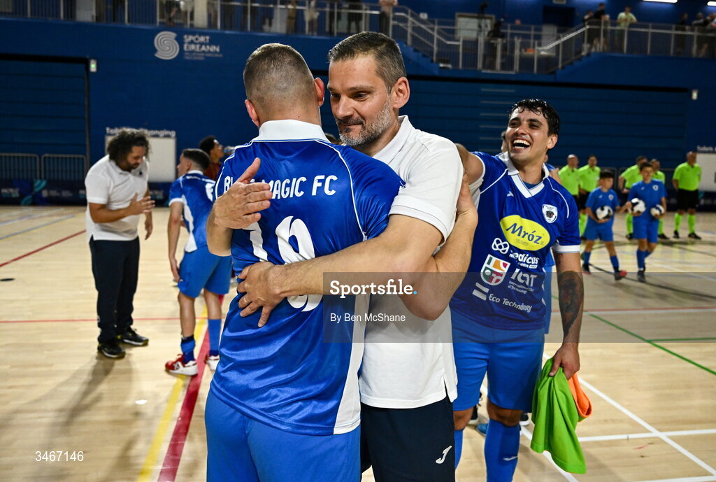 24 May 2026; Blue Magic head coach Sinisa Sicar, right, celebrates with Gustavo Pereira da Silva of Blue Magic after the FAI Futsal Cup final match between Leinster Futsal and Blue Magic at the National Indoor Arena in Abbotstown, Dublin. Photo by Ben McShane/Sportsfile