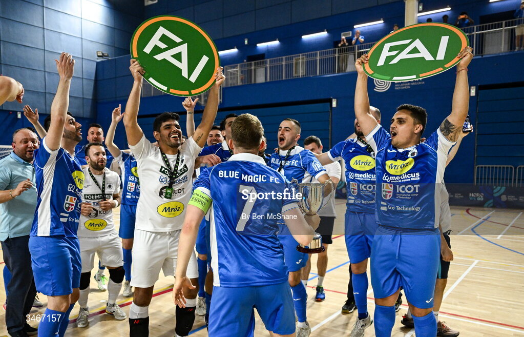 24 May 2026; Blue Magic captain Ian Byrne celebrates with the cup and his teammates after the FAI Futsal Cup final match between Leinster Futsal and Blue Magic at the National Indoor Arena in Abbotstown, Dublin. Photo by Ben McShane/Sportsfile