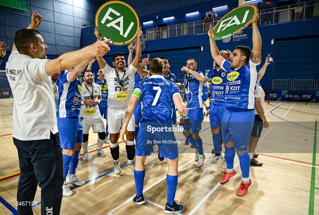 24 May 2026; Blue Magic captain Ian Byrne celebrates with the cup and his teammates after the FAI Futsal Cup final match between Leinster Futsal and Blue Magic at the National Indoor Arena in Abbotstown, Dublin. Photo by Ben McShane/Sportsfile
