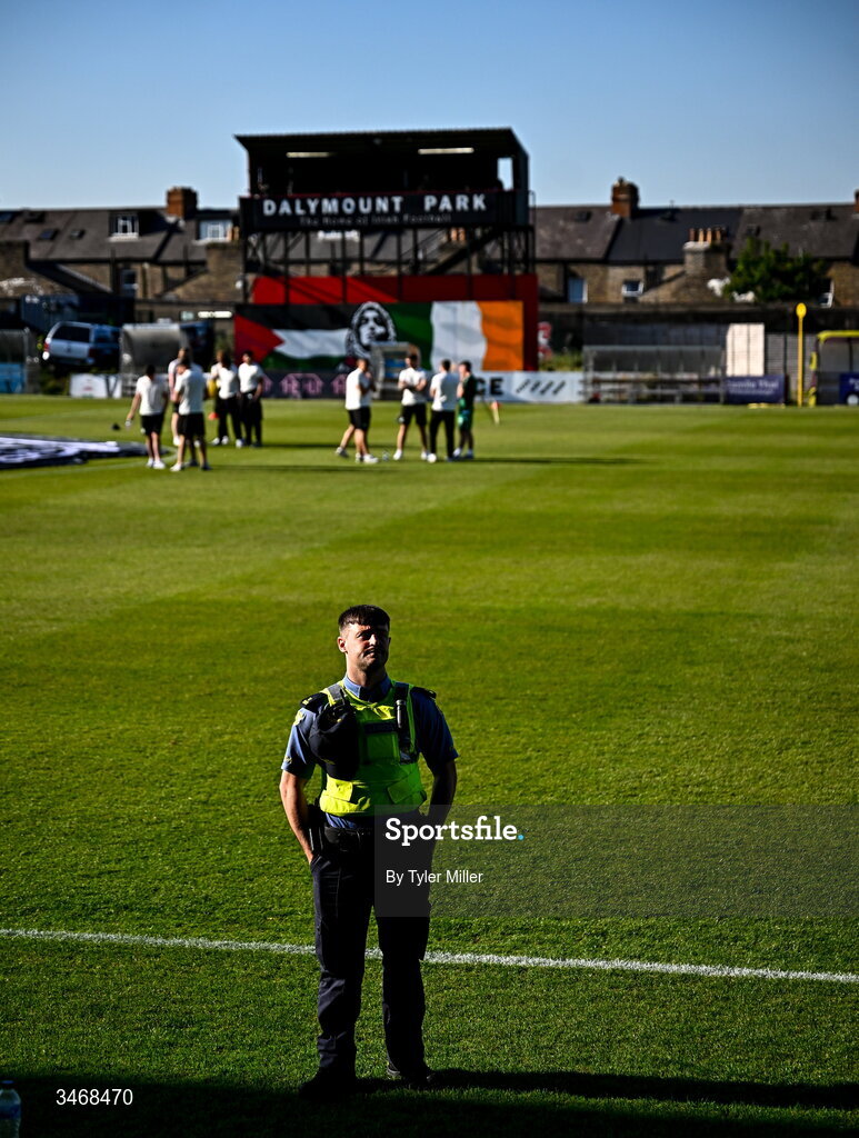 25 May 2026; A member of An Garda Síochána watches the stands from pitch as Shamrock Rovers players inspect the pitch before the SSE Airtricity Men’s Premier Division match between Bohemians and Shamrock Rovers at Dalymount Park in Dublin. Photo by Tyler Miller/Sportsfile