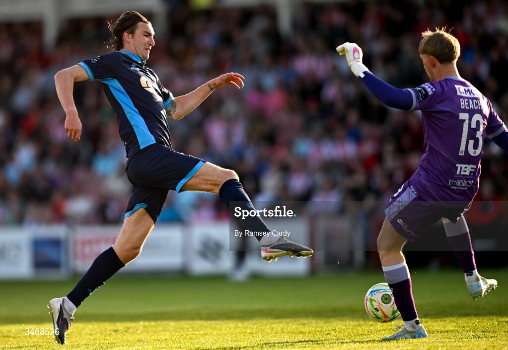 25 May 2026; Derry City goalkeeper Eddie Beach and Sean Boyd of Shelbourne during the SSE Airtricity Men’s Premier Division match between Derry City and Shelbourne at Find Insurance Celtic Park in Derry. Photo by Ramsey Cardy/Sportsfile