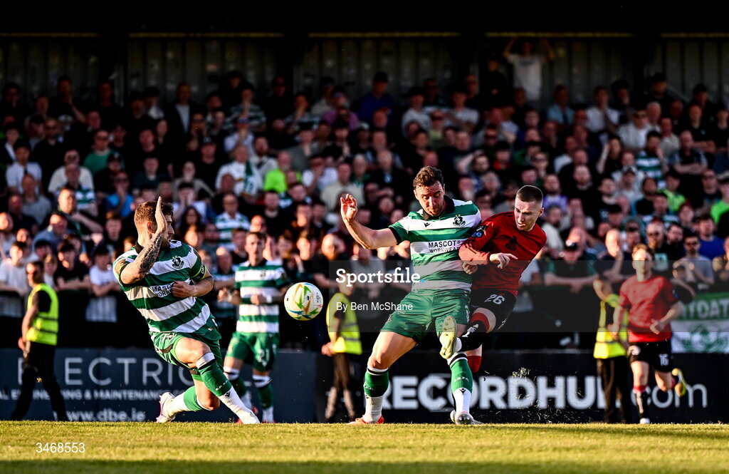 25 May 2026; Ross Tierney of Bohemians has a shot on goal despite the attention of Enda Stevens of Shamrock Rovers during the SSE Airtricity Men’s Premier Division match between Bohemians and Shamrock Rovers at Dalymount Park in Dublin. Photo by Ben McShane/Sportsfile