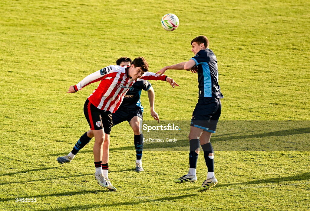 25 May 2026; James Clarke of Derry City in action against Zeno Ibsen Rossi, centre, and Sean Gannon of Shelbourne during the SSE Airtricity Men’s Premier Division match between Derry City and Shelbourne at Find Insurance Celtic Park in Derry. Photo by Ramsey Cardy/Sportsfile
