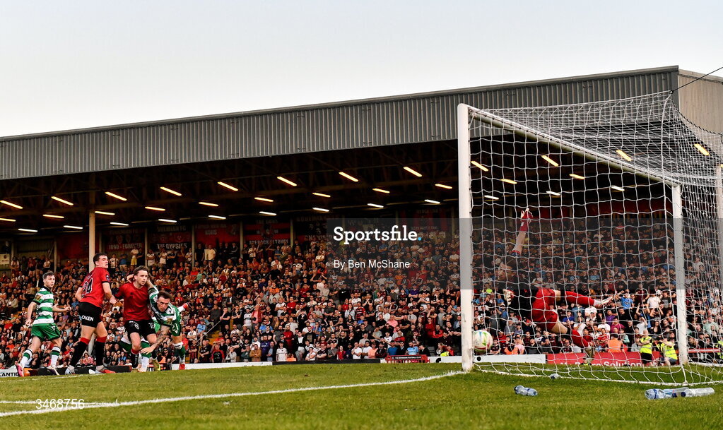 25 May 2026; John McGovern of Shamrock Rovers, hideen, heads to score his side's first goal past Bohemians goalkeeper Kacper Chorazka during the SSE Airtricity Men’s Premier Division match between Bohemians and Shamrock Rovers at Dalymount Park in Dublin. Photo by Ben McShane/Sportsfile