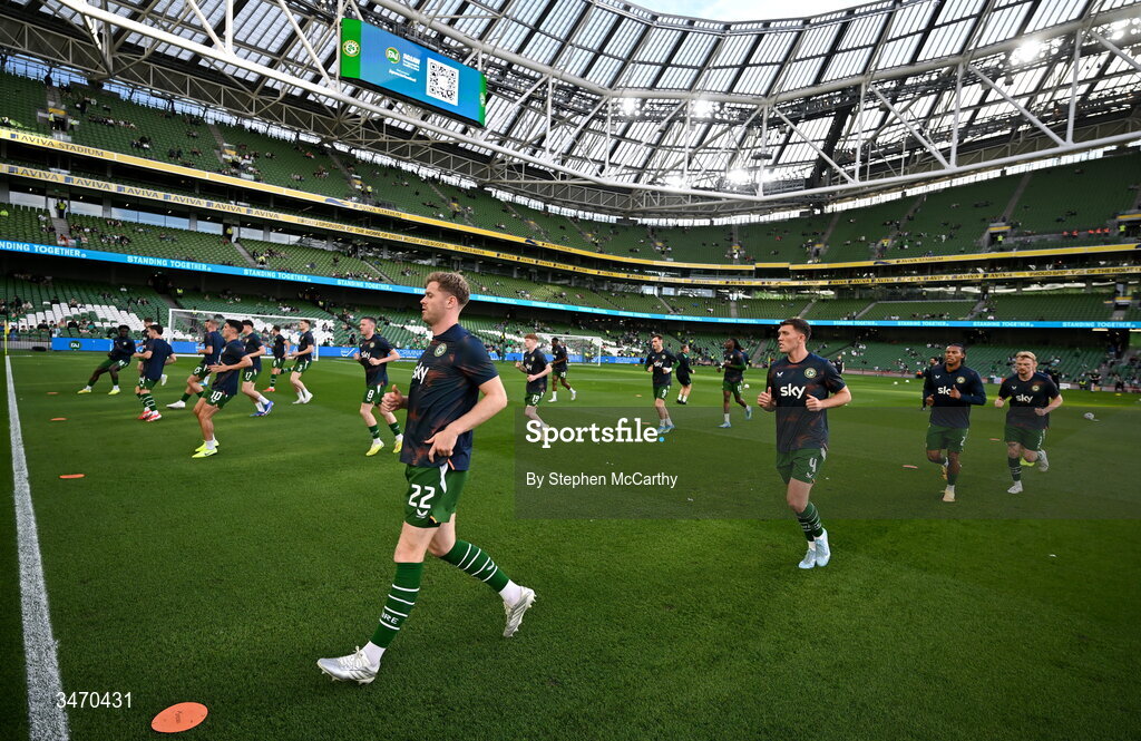 28 May 2026; Nathan Collins of Republic of Ireland and teammates warm-up before the international friendly match between Republic of Ireland and Qatar at the Aviva Stadium in Dublin. Photo by Stephen McCarthy/Sportsfile