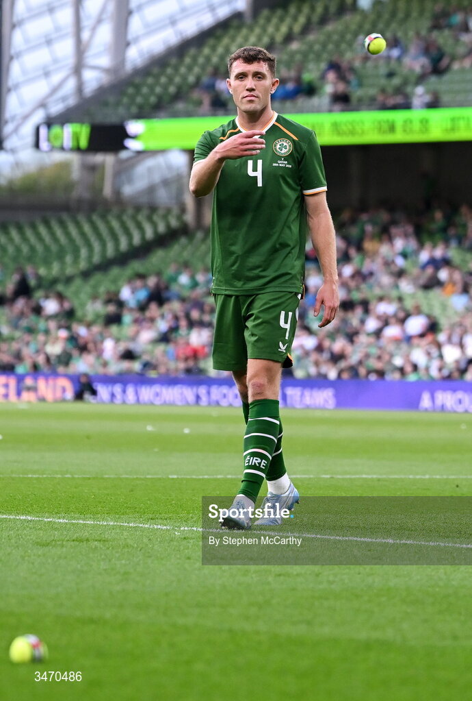 28 May 2026; Dara O'Shea of Republic of Ireland throws a tennis ball off the pitch the international friendly match between Republic of Ireland and Qatar at the Aviva Stadium in Dublin. Photo by Stephen McCarthy/Sportsfile