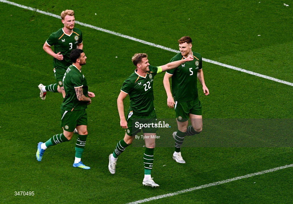 28 May 2026; Nathan Collins of Republic of Ireland, centre, celebrates after scoring his side's first goal during the international friendly match between Republic of Ireland and Qatar at the Aviva Stadium in Dublin. Photo by Tyler Miller/Sportsfile