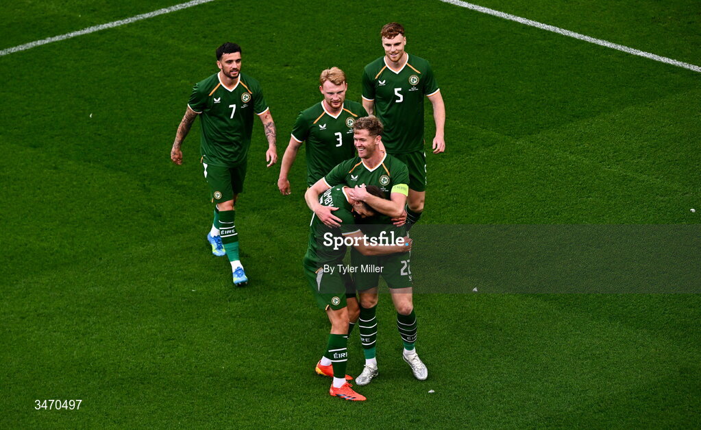28 May 2026; Nathan Collins of Republic of Ireland, bottom right, celebrates with team-mate Jayson Molumby after scoring their side's first goal during the international friendly match between Republic of Ireland and Qatar at the Aviva Stadium in Dublin. Photo by Tyler Miller/Sportsfile
