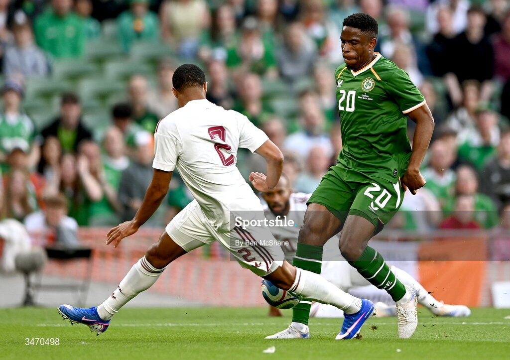 28 May 2026; Chiedozie Ogbene of Republic of Ireland in action against Pedro Miguel of Qatar during the international friendly match between Republic of Ireland and Qatar at the Aviva Stadium in Dublin. Photo by Ben McShane/Sportsfile