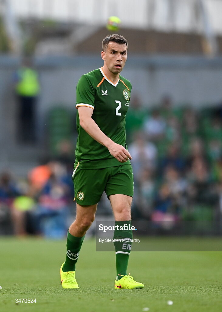 28 May 2026; Seamus Coleman of Republic of Ireland clears tennis balls from the pitch during the international friendly match between Republic of Ireland and Qatar at the Aviva Stadium in Dublin. Photo by Stephen McCarthy/Sportsfile