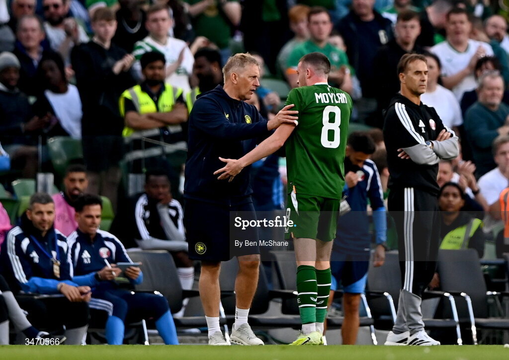 28 May 2026; Jack Moylan of Republic of Ireland is consoled by manager Heimir Hallgrimsson after being shown a red card during the international friendly match between Republic of Ireland and Qatar at the Aviva Stadium in Dublin. Photo by Ben McShane/Sportsfile
