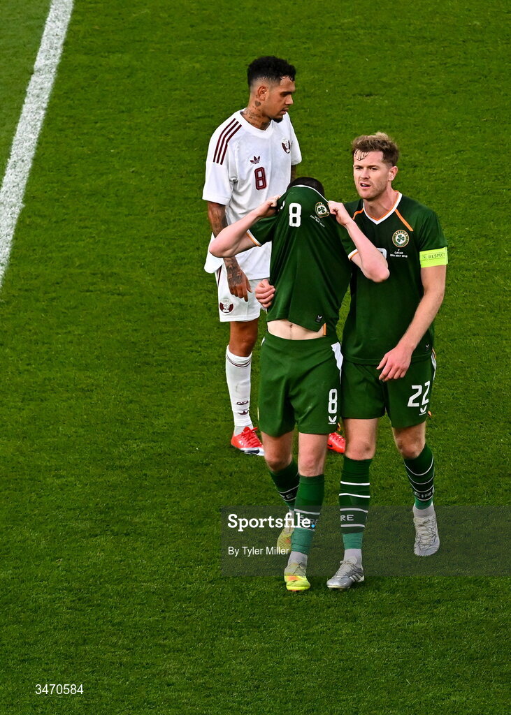 28 May 2026; Jack Moylan of Republic of Ireland, 8, is consoled by teammate Nathan Collins after being shown a red card during the international friendly match between Republic of Ireland and Qatar at the Aviva Stadium in Dublin. Photo by Tyler Miller/Sportsfile