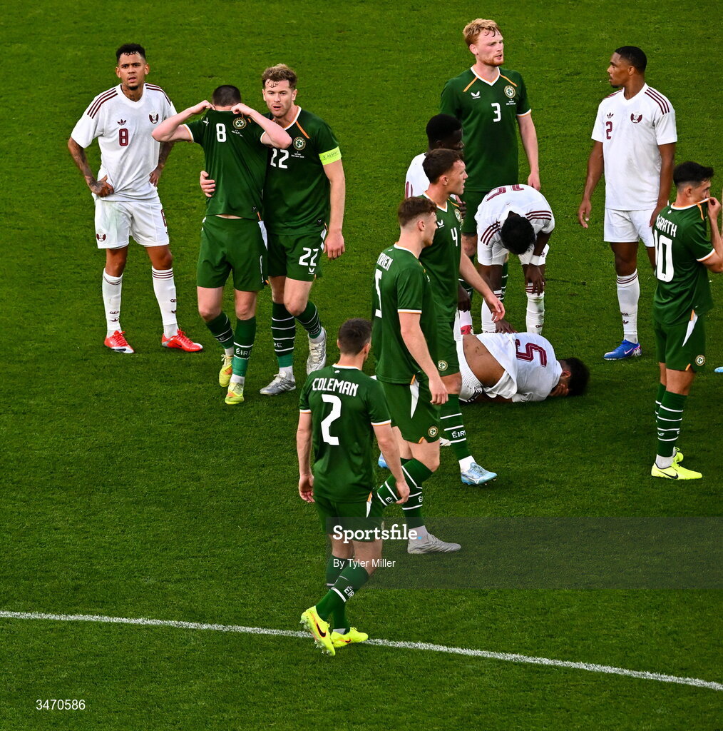 28 May 2026; Jack Moylan of Republic of Ireland, 8, is consoled by teammate Nathan Collins after being shown a red card during the international friendly match between Republic of Ireland and Qatar at the Aviva Stadium in Dublin. Photo by Tyler Miller/Sportsfile