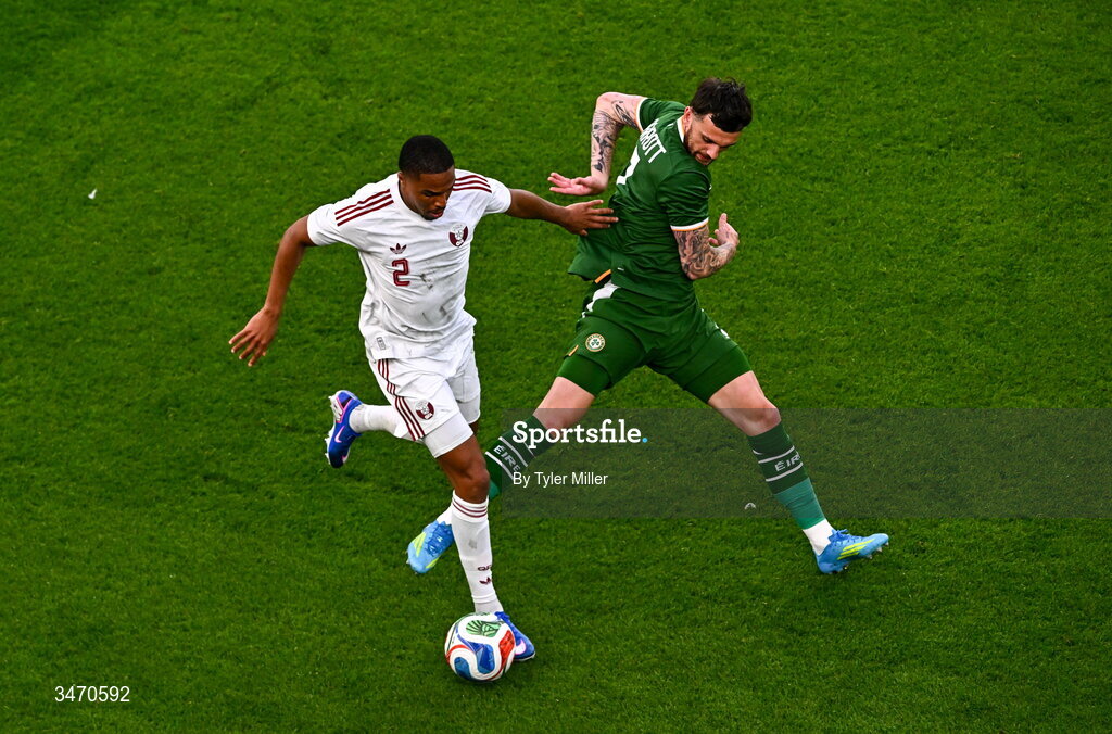 28 May 2026; Pedro Miguel of Qatar in action against Troy Parrott of Republic of Ireland during the international friendly match between Republic of Ireland and Qatar at the Aviva Stadium in Dublin. Photo by Tyler Miller/Sportsfile