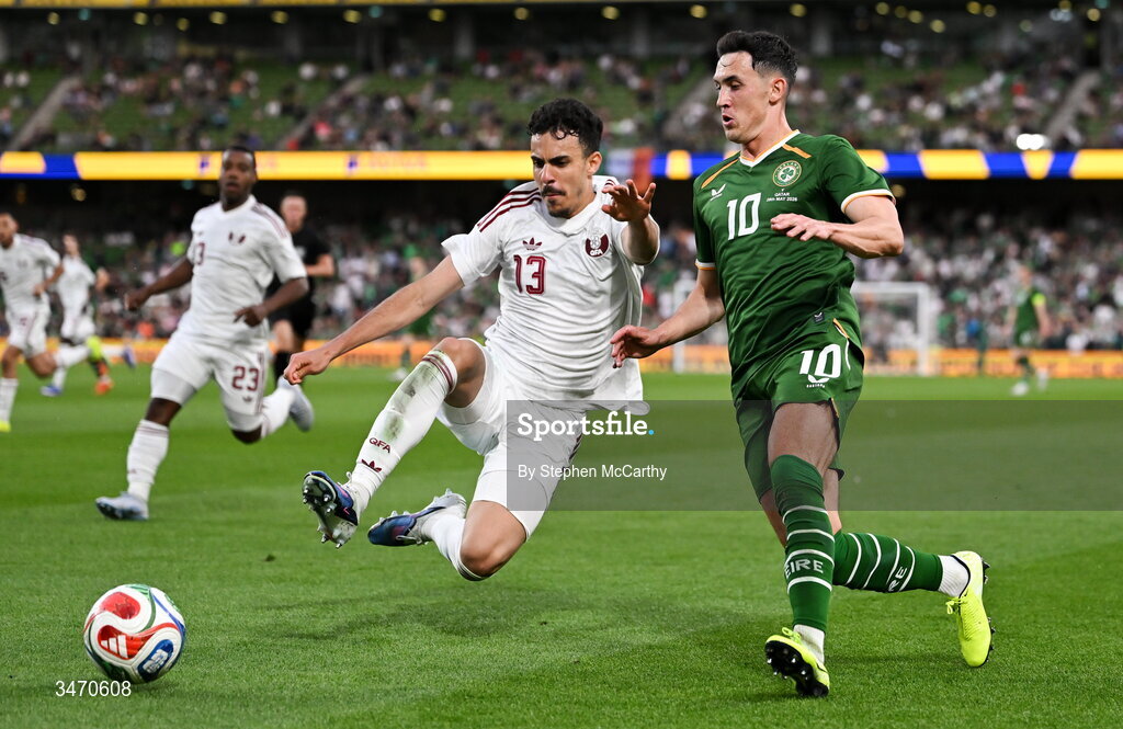 28 May 2026; Jamie McGrath of Republic of Ireland in action against Assim Madibo of Qatar during the international friendly match between Republic of Ireland and Qatar at the Aviva Stadium in Dublin. Photo by Stephen McCarthy/Sportsfile