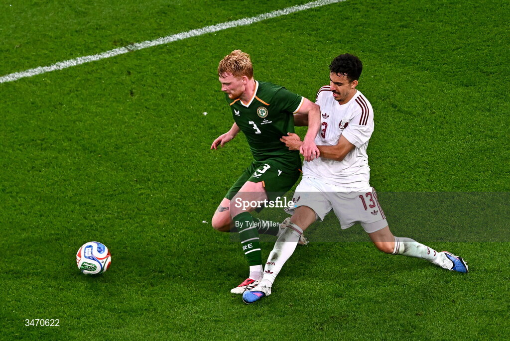 28 May 2026; Liam Scales of Republic of Ireland in action against Ayoub Al-Oui of Qatar during the international friendly match between Republic of Ireland and Qatar at the Aviva Stadium in Dublin. Photo by Tyler Miller/Sportsfile