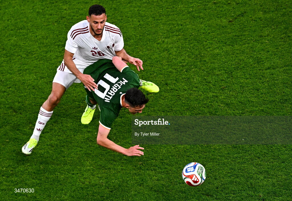 28 May 2026; Jamie McGrath of Republic of Ireland is tackled by Mohamed Al-Mannai of Qatar during the international friendly match between Republic of Ireland and Qatar at the Aviva Stadium in Dublin. Photo by Tyler Miller/Sportsfile