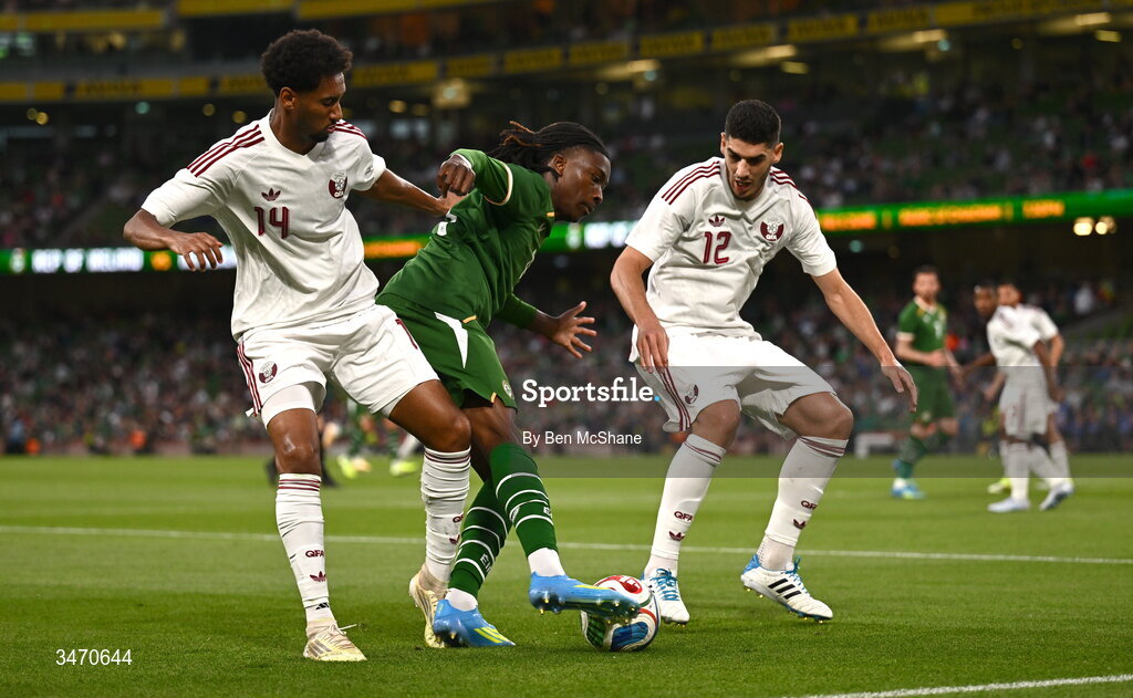 28 May 2026; Jaden Umeh of Republic of Ireland in action against Qatar players Hommam Elamin, left, and Karim Boudiaf during the international friendly match between Republic of Ireland and Qatar at the Aviva Stadium in Dublin. Photo by Ben McShane/Sportsfile