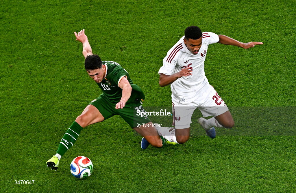 28 May 2026; Jamie McGrath of Republic of Ireland is tackled by Al Hashmi Al Hussain of Qatar during the international friendly match between Republic of Ireland and Qatar at the Aviva Stadium in Dublin. Photo by Tyler Miller/Sportsfile
