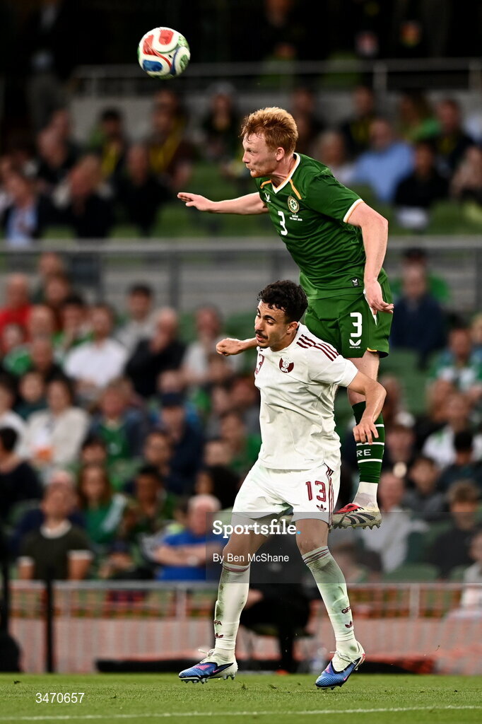 28 May 2026; Liam Scales of Republic of Ireland in action against Ayoub Al-Oui of Qatar during the international friendly match between Republic of Ireland and Qatar at the Aviva Stadium in Dublin. Photo by Ben McShane/Sportsfile