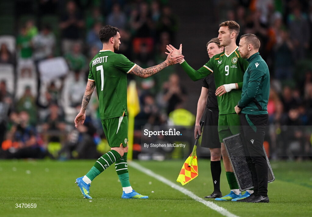 28 May 2026; Troy Parrott of Republic of Ireland, left, is replaced by teammate Mason Melia during a substitution during the international friendly match between Republic of Ireland and Qatar at the Aviva Stadium in Dublin. Photo by Stephen McCarthy/Sportsfile
