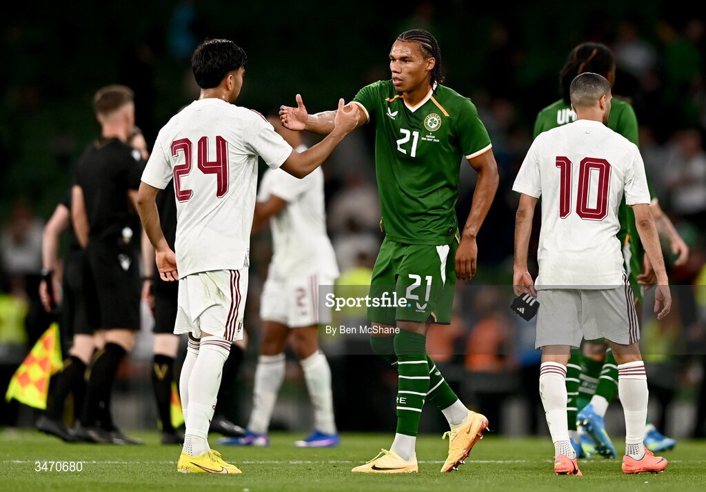 28 May 2026; Corrie Ndaba of Republic of Ireland and Tahsin Jamshid of Qatar after the international friendly match between Republic of Ireland and Qatar at the Aviva Stadium in Dublin. Photo by Ben McShane/Sportsfile