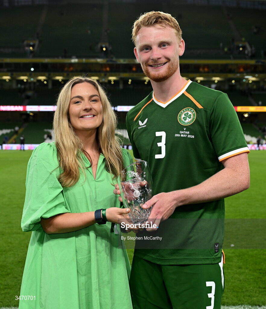 28 May 2026; Liam Scales of Republic of Ireland is presented with the player of the match award by Louise O'Mahony, marketing controller, Sky Ireland, the international friendly match between Republic of Ireland and Qatar at the Aviva Stadium in Dublin. Photo by Stephen McCarthy/Sportsfile