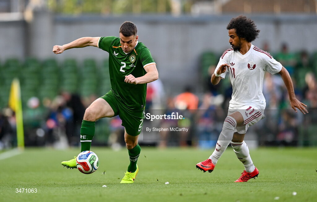 28 May 2026; Seamus Coleman of Republic of Ireland and Akram Afif of Qatar during the international friendly match between Republic of Ireland and Qatar at the Aviva Stadium in Dublin. Photo by Stephen McCarthy/Sportsfile