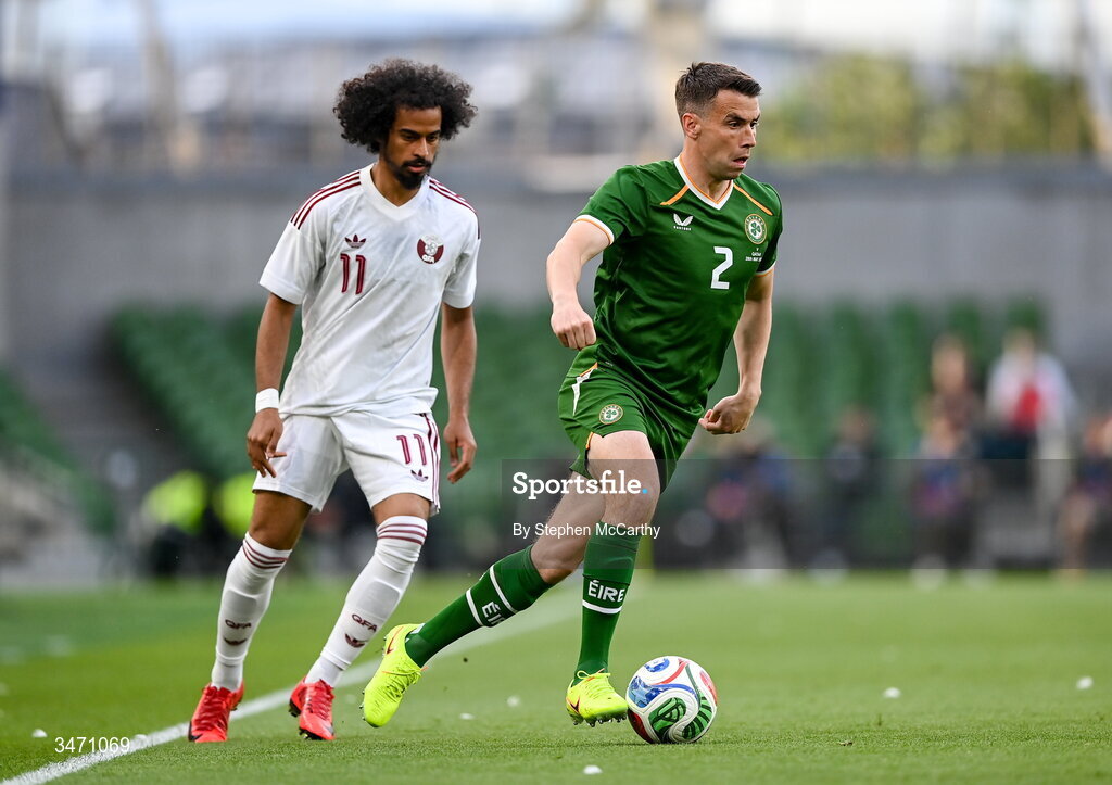 28 May 2026; Seamus Coleman of Republic of Ireland and Akram Afif of Qatar during the international friendly match between Republic of Ireland and Qatar at the Aviva Stadium in Dublin. Photo by Stephen McCarthy/Sportsfile