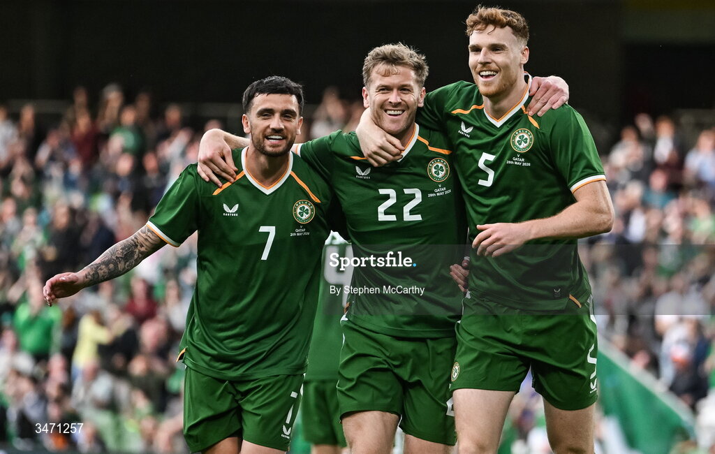 28 May 2026; Nathan Collins of Republic of Ireland, centre, celebrates with teammates Troy Parrott, left, and Jake O'Brien after scoring their side's first goal during the international friendly match between Republic of Ireland and Qatar at the Aviva Stadium in Dublin.  Photo by Stephen McCarthy/Sportsfile