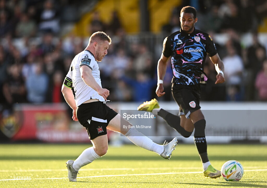 29 May 2026; Daryl Horgan of Dundalk scores his side's first goal despite the attention of Barry Cotter of Derry City during the SSE Airtricity Men’s Premier Division match between Dundalk and Derry City at Oriel Park in Dundalk, Louth. Photo by Ben McShane/Sportsfile