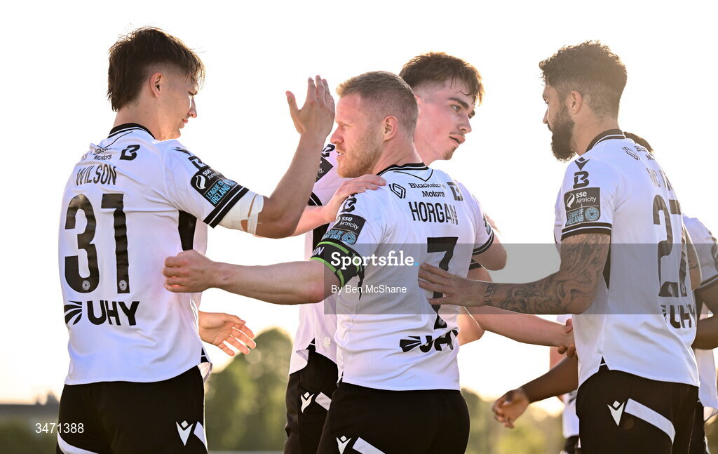 29 May 2026; Daryl Horgan of Dundalk, second from left, celebrates with teammates, from left, John Ross Wilson, Eoin Kenny and Declan McDaid after scoring their side's first goal during the SSE Airtricity Men’s Premier Division match between Dundalk and Derry City at Oriel Park in Dundalk, Louth. Photo by Ben McShane/Sportsfile