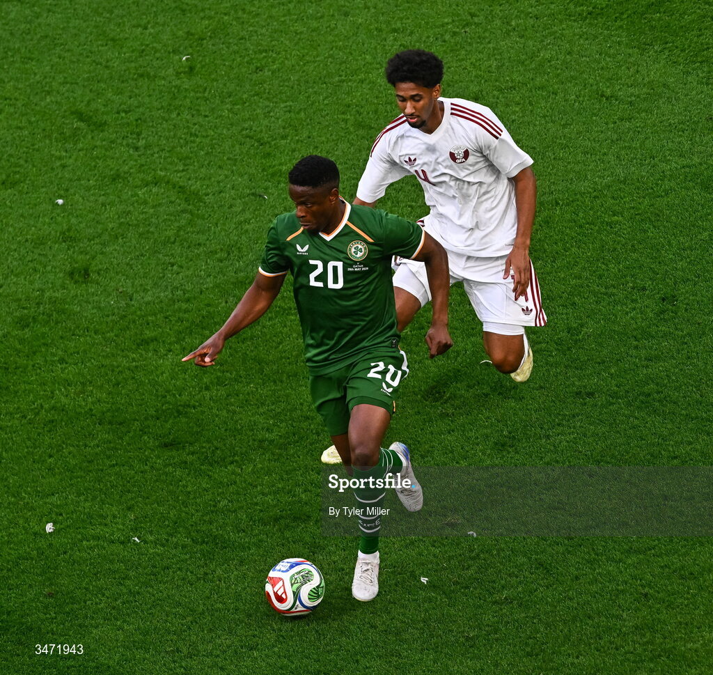 28 May 2026; Chiedozie Ogbene of Republic of Ireland in action against Issa Laye of Qatar during the international friendly match between Republic of Ireland and Qatar at the Aviva Stadium in Dublin. Photo by Tyler Miller/Sportsfile